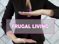 FRUGAL LIVING inscription on the screen. Frugal livingÃÂ is the act of being very intentional with your spending